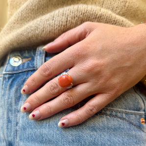 Coral and platinum ring