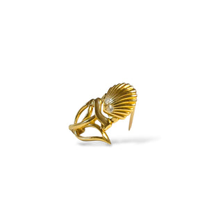Broche commémorative pour Shell