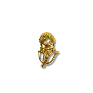 Broche commémorative pour Shell