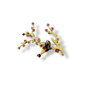 Broche oiseau dans un cerisier