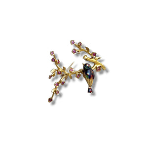 Broche oiseau dans un cerisier