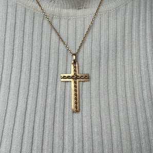 Twisted cross pendant