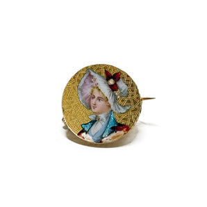 Broche femme au chapeau